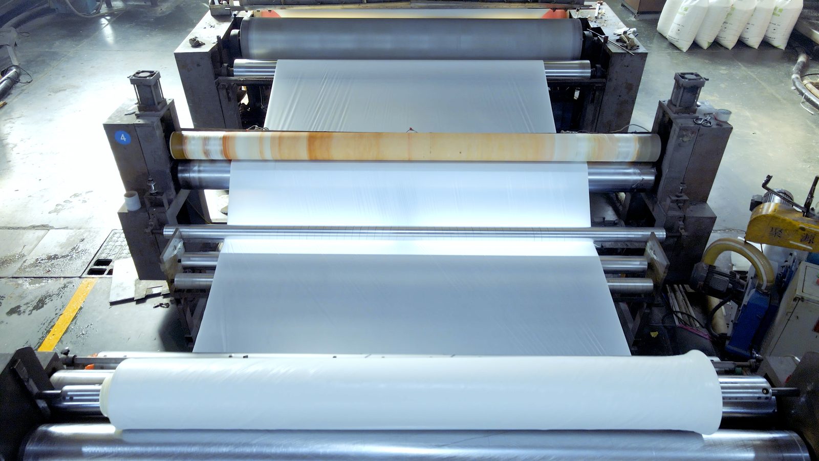 Blown film extrusion line running wide plastic tablecloth film