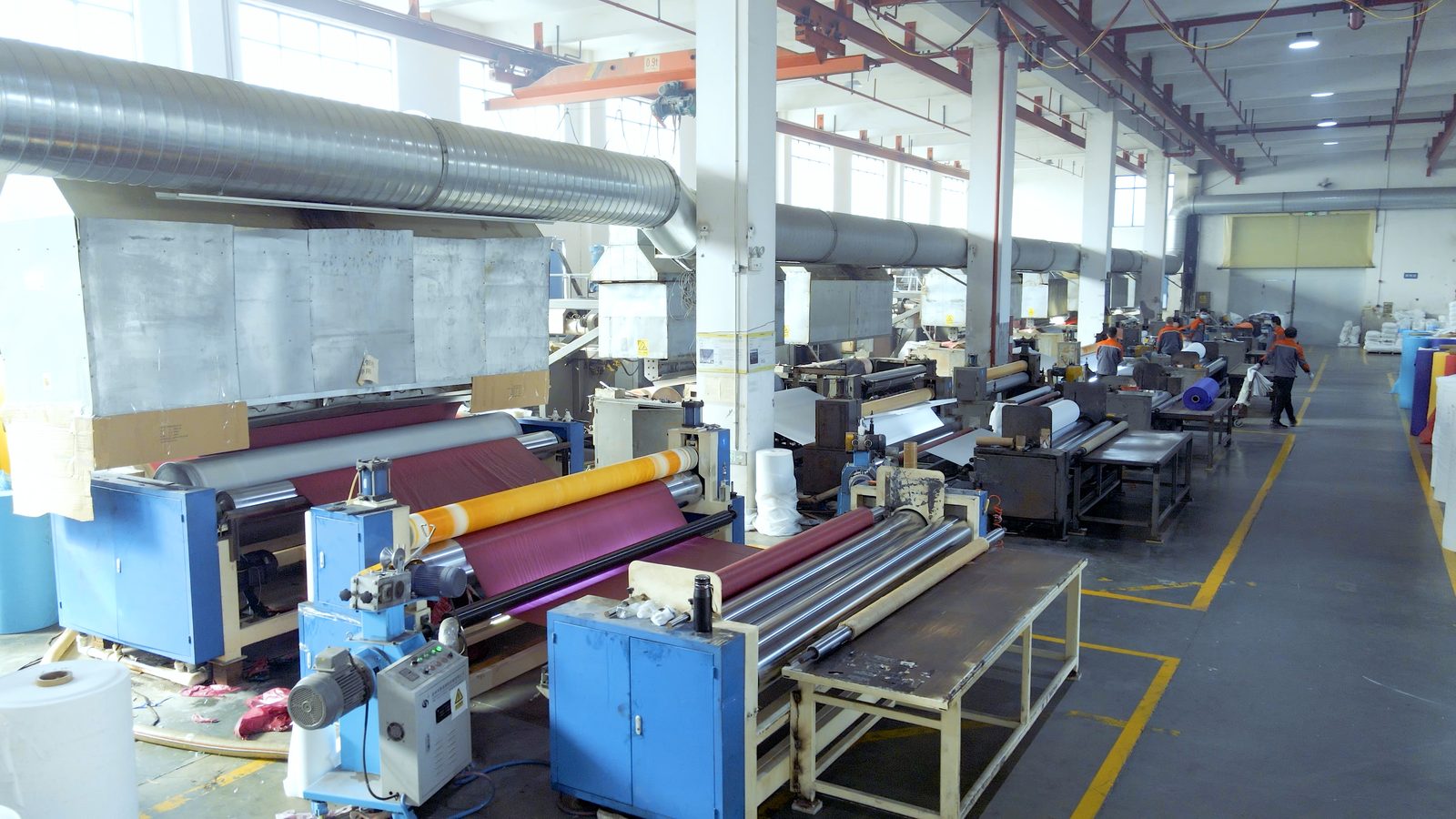 Runxiang Plastic production floor showing film extrusion and roll slitting lines